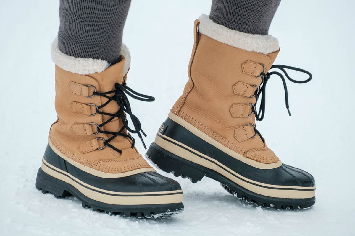 Notebook Politiebureau Mooie vrouw Sorel Caribou snowboots; warme en droge voeten - Reislegende.nl