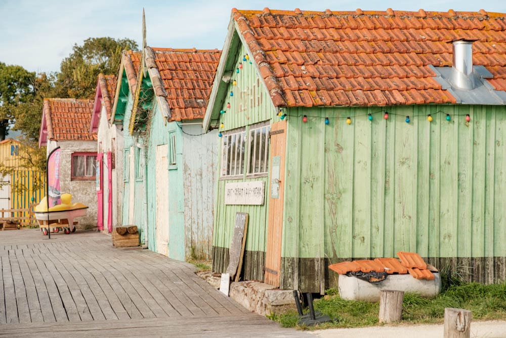 Île d’Oléron gekleurde huisjes Couleurs Cabanes Charente Maritime Nieuw Aquitanie Frankrijk - Reislegende.nl