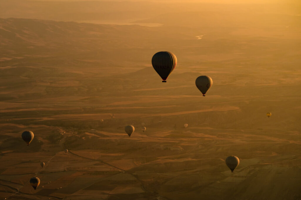 Luchtballonnen fotograferen tijdens ballonvaart in Cappadocie Turkije Goreme - Reislegende.nl
